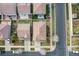 Birds-eye view showcasing the roof and backyards of residential properties in a suburban neighborhood setting at 5559 Gibraltar St, Denver, CO 80249