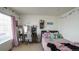 Charming bedroom with a window desk and a full-sized bed at 5559 Gibraltar St, Denver, CO 80249