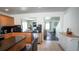 Modern kitchen with granite countertops, stainless steel appliances, and seamless access to the living area at 5559 Gibraltar St, Denver, CO 80249