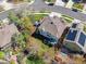 An aerial view of a home with a backyard gazebo and lush green landscaping at 2359 Dogwood Dr, Erie, CO 80516
