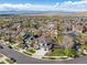 Expansive aerial view of a residential neighborhood with mountain views, showcasing the home's prime location at 2359 Dogwood Dr, Erie, CO 80516