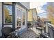 Charming deck with outdoor seating, perfect for relaxing and enjoying the views at 2359 Dogwood Dr, Erie, CO 80516