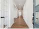 Bright entryway with wood-look floors and modern white trim at 8601 Yellowcress St, Littleton, CO 80125