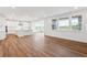 Open living room with a view of the kitchen and backyard at 8601 Yellowcress St, Littleton, CO 80125