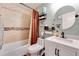 Bathroom with tiled shower and modern vanity with sink at 11207 Tumbleweed Way, Parker, CO 80138