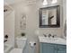 Well-lit bathroom features modern fixtures, stylish vanity and shower-tub combination at 12059 S Tallkid Ct, Parker, CO 80138