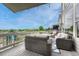 Outdoor deck area with cozy seating, string lights, and scenic views offering a perfect space for entertaining at 12059 S Tallkid Ct, Parker, CO 80138