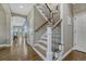 Staircase with wood and metal handrail at 12059 S Tallkid Ct, Parker, CO 80138