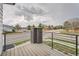 A view from the home's balcony provides vistas of the surrounding neighborhood street at 5107 S Fairplay St, Aurora, CO 80015