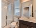 Bathroom with modern fixtures and a walk-in shower at 5107 S Fairplay St, Aurora, CO 80015