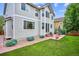 Spacious backyard with lush lawn and patio, ideal for outdoor gatherings at 2810 Shadow Dance Dr, Castle Rock, CO 80109