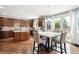 Open kitchen featuring ample cabinet space, breakfast nook and access to outdoor living space at 2810 Shadow Dance Dr, Castle Rock, CO 80109