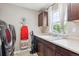 Laundry room with front load washer and dryer and plenty of counter space at 2810 Shadow Dance Dr, Castle Rock, CO 80109