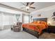 Spacious main bedroom with a comfortable king bed and large window with bright natural light at 2810 Shadow Dance Dr, Castle Rock, CO 80109