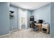 Cozy home office space with a neutral palette and ample natural light from the window at 2810 Shadow Dance Dr, Castle Rock, CO 80109