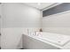 Modern bathroom featuring a sleek soaking tub and neutral color palette at 1863 Wazee St # 4E, Denver, CO 80202