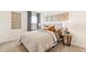 Serene bedroom with warm decor, stylish wall art, and side tables at 27664 E Byers Ave, Aurora, CO 80018