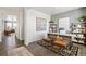 Modern home office featuring stylish decor, wood floors, and ample workspace at 27664 E Byers Ave, Aurora, CO 80018