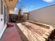 Backyard features a private patio, perimeter landscaping, and a storage shed at 630 S Youngfield Ct, Lakewood, CO 80228