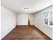 Spacious main bedroom features hardwood floors, ensuite, and a large bright window at 630 S Youngfield Ct, Lakewood, CO 80228