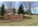 Community entrance featuring a stone sign with landscaping at 10383 Erin Pl, Lone Tree, CO 80124