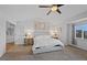 Bright main bedroom with vaulted ceilings, comfortable carpet, and neutral decor at 10383 Erin Pl, Lone Tree, CO 80124