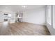 Open concept floor plan features modern furnishings and an open view to the kitchen at 22103 E 38Th Pl, Aurora, CO 80019