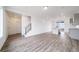 Open concept floor plan with staircase and view into kitchen at 22103 E 38Th Pl, Aurora, CO 80019