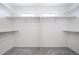 Spacious walk-in closet with ample shelving and rods for organized storage at 22103 E 38Th Pl, Aurora, CO 80019