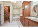 Bathroom features a jacuzzi tub and a separate glass shower at 2609 S Quebec S St # 20, Denver, CO 80231