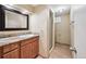 Bathroom featuring a sink and a glass shower at 2609 S Quebec S St # 20, Denver, CO 80231