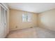 Bright bedroom featuring ample natural light and neutral carpet at 2609 S Quebec S St # 20, Denver, CO 80231