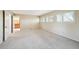 Large bedroom with neutral carpet and bright, natural light at 2609 S Quebec S St # 20, Denver, CO 80231