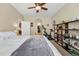 Bedroom featuring neutral walls, carpet, and access to a walk-in closet at 11307 Navajo Cir # A, Westminster, CO 80234