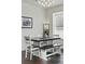 Dining room with bench seating and modern chandelier at 11307 Navajo Cir # A, Westminster, CO 80234