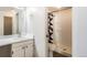 Clean bathroom with a shower featuring modern fixtures and stylish accents at 11753 Pennsylvania St, Northglenn, CO 80233