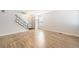 Living room featuring wood-look floors, stairs and a bright interior at 11753 Pennsylvania St, Northglenn, CO 80233