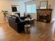 Cozy living room with fireplace, modern decor, and ample natural light at 11753 Pennsylvania St, Northglenn, CO 80233