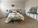 Serene main bedroom with plush bedding, stylish furniture, and soft lighting at 11753 Pennsylvania St, Northglenn, CO 80233