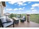 Outdoor deck features comfortable seating and a cozy fire pit at 1236 Castlecombe Ln, Monument, CO 80132