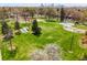 Aerial of playground near neighborhood, green space, and with city views at 3600 N Race St, Denver, CO 80205