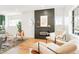 Cozy living room featuring a fireplace and stylish furniture at 3600 N Race St, Denver, CO 80205