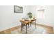 Bright home office boasts a modern desk, a large window with natural light, and wood flooring at 3600 N Race St, Denver, CO 80205