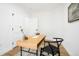 Bright office boasts a modern desk and natural light, perfect for working from home at 3600 N Race St, Denver, CO 80205