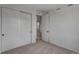 Bright bedroom features closet space and an entrance to another room at 1415 Great Western Dr, Longmont, CO 80501