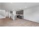 Modern kitchen with an island, gray cabinetry, stainless steel appliances, and open to the living space at 1415 Great Western Dr, Longmont, CO 80501