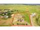 Aerial view of a large property with home, shed, and boundary highlighted in red at 35675 Cheyenne Trl, Elizabeth, CO 80107