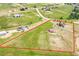 Aerial view of a large property with a home, shed, and expansive greenery bordered in red at 35675 Cheyenne Trl, Elizabeth, CO 80107