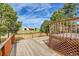 Large wooden deck perfect for outdoor enjoyment and entertainment at 35675 Cheyenne Trl, Elizabeth, CO 80107