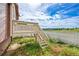 Charming back deck with scenic views of the property and surrounding landscape at 35675 Cheyenne Trl, Elizabeth, CO 80107